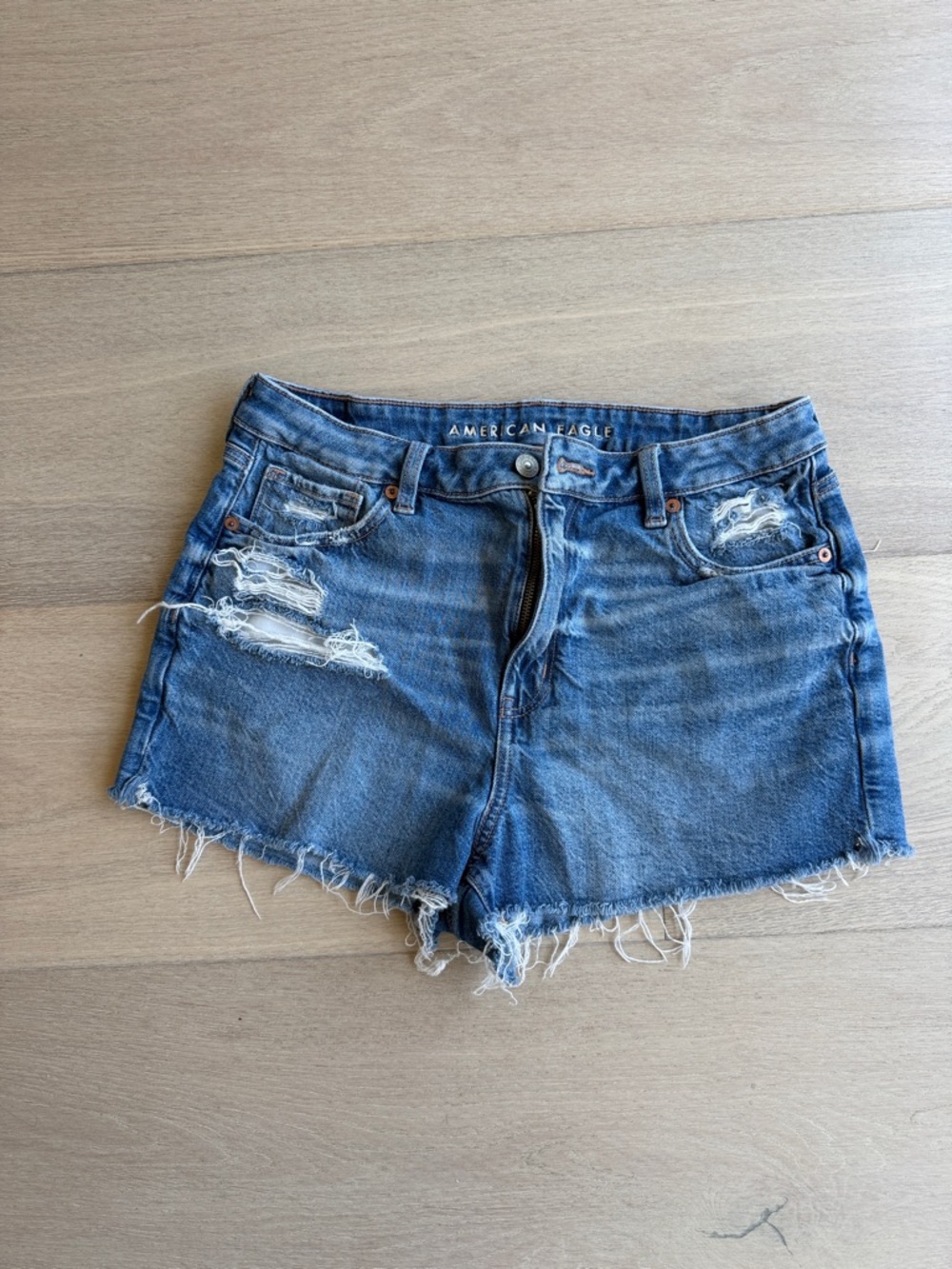 American Eagle Outfitters distressed blue denim cutoff shorts